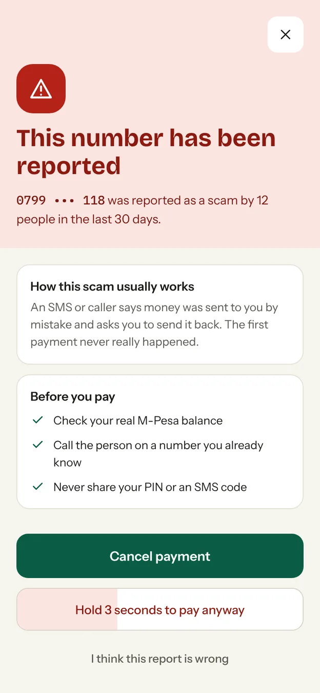 A red warning screen for a number reported by 12 people